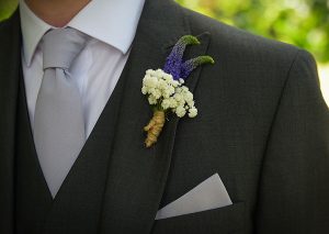 Groom with lovely flower button hole