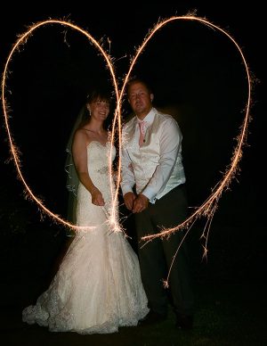 Night Photograph Bride and Groom Wedding sparkler heart