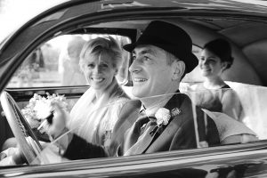 Bride and Groom in vintage car in Maidenhead Registry Officce