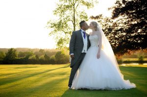 Bride and Groom Kissing at their wedding at Bisham Abbey in Berkshire