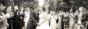 Photograph Bride and Groom Wedding bubbles confetti fun Pinewood Hotel, Slough